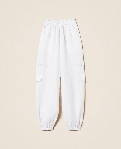 Linen and broderie anglaise jogger trousers
