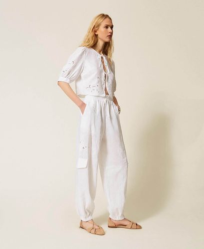 Linen and broderie anglaise jogger trousers