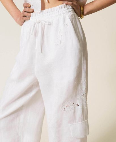 Linen and broderie anglaise jogger trousers