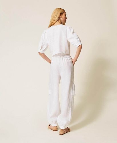 Linen and broderie anglaise jogger trousers