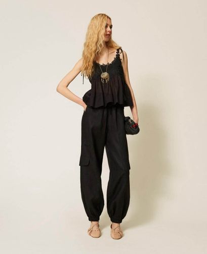 Linen and broderie anglaise jogger trousers