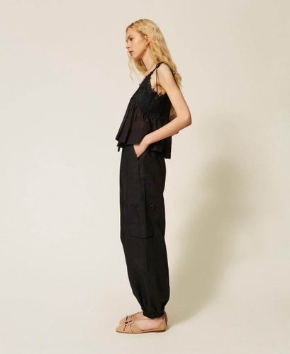 Linen and broderie anglaise jogger trousers