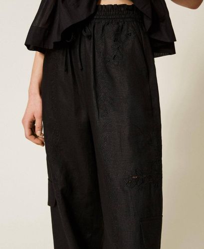 Linen and broderie anglaise jogger trousers