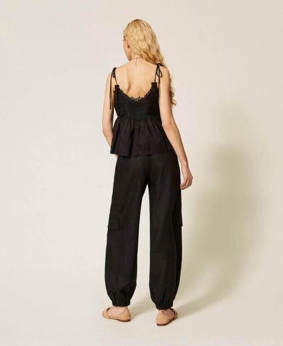 Linen and broderie anglaise jogger trousers