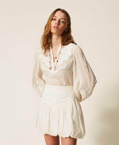 Ramie mini skirt with embroidery