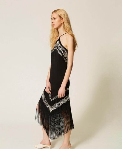Long dress with floral embroidery