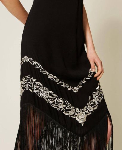 Long dress with floral embroidery