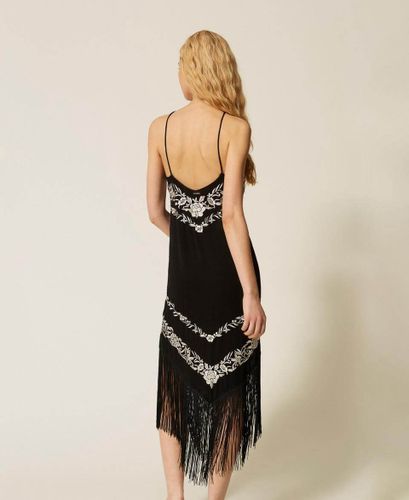 Long dress with floral embroidery