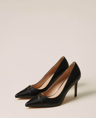High heeled leather court shoes