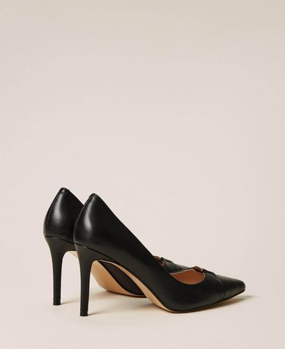 High heeled leather court shoes