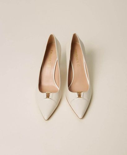 High heeled leather court shoes GIGLIO
