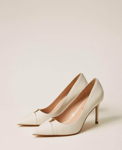 High heeled leather court shoes GIGLIO