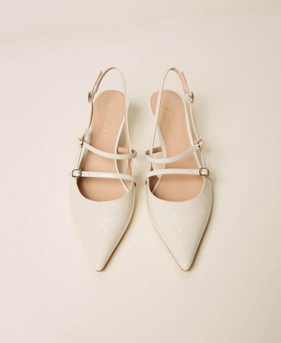 Sling back court shoes with straps