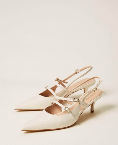 Sling back court shoes with straps