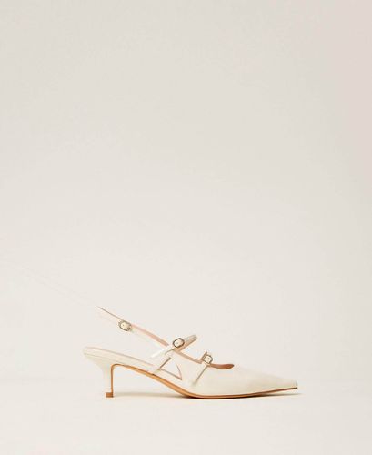Sling back court shoes with straps