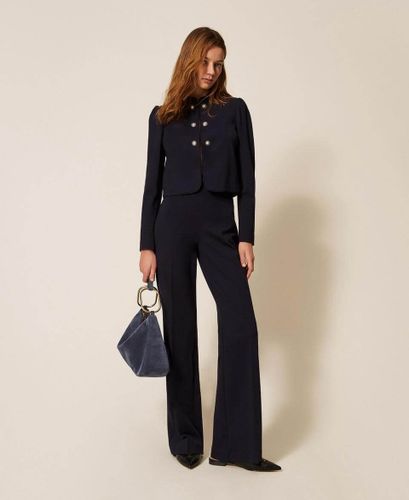 Wide leg trousers with pearl buttons