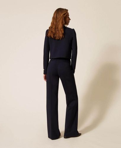 Wide leg trousers with pearl buttons
