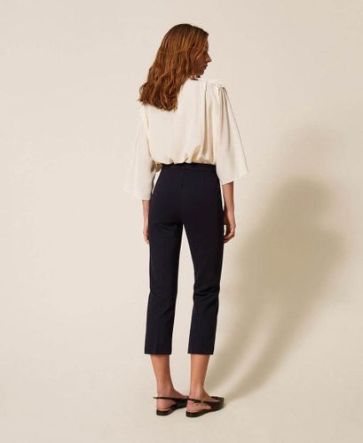Cigarette trousers with décor