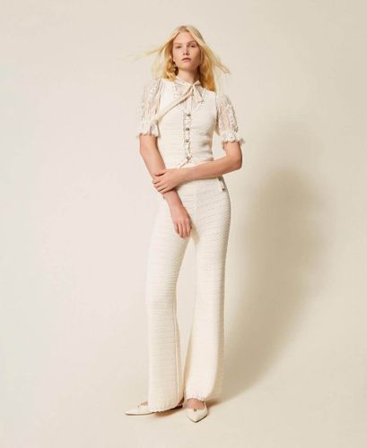 Knit waistcoat with crochet detail