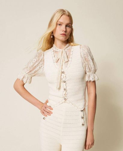 Knit waistcoat with crochet detail