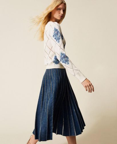 Long pleated denim skirt