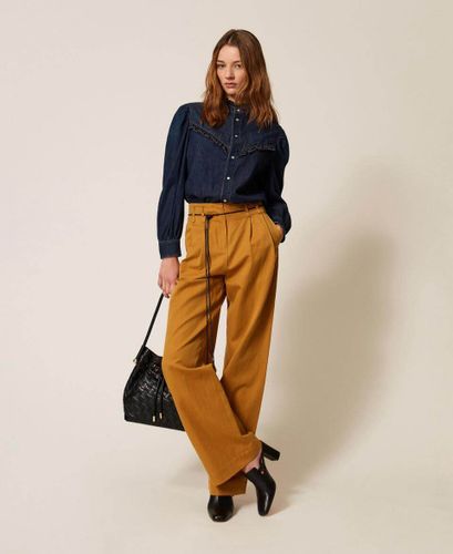 Denim shirt with ruffles