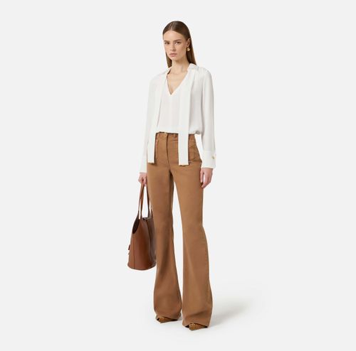 Blouse in viscose georgette fabric with sash belt