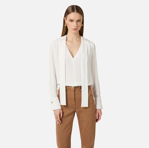 Blouse in viscose georgette fabric with sash belt
