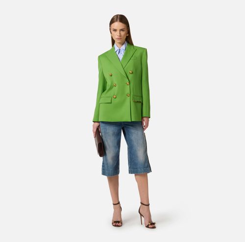 Cool wool jacket with jewel plaque