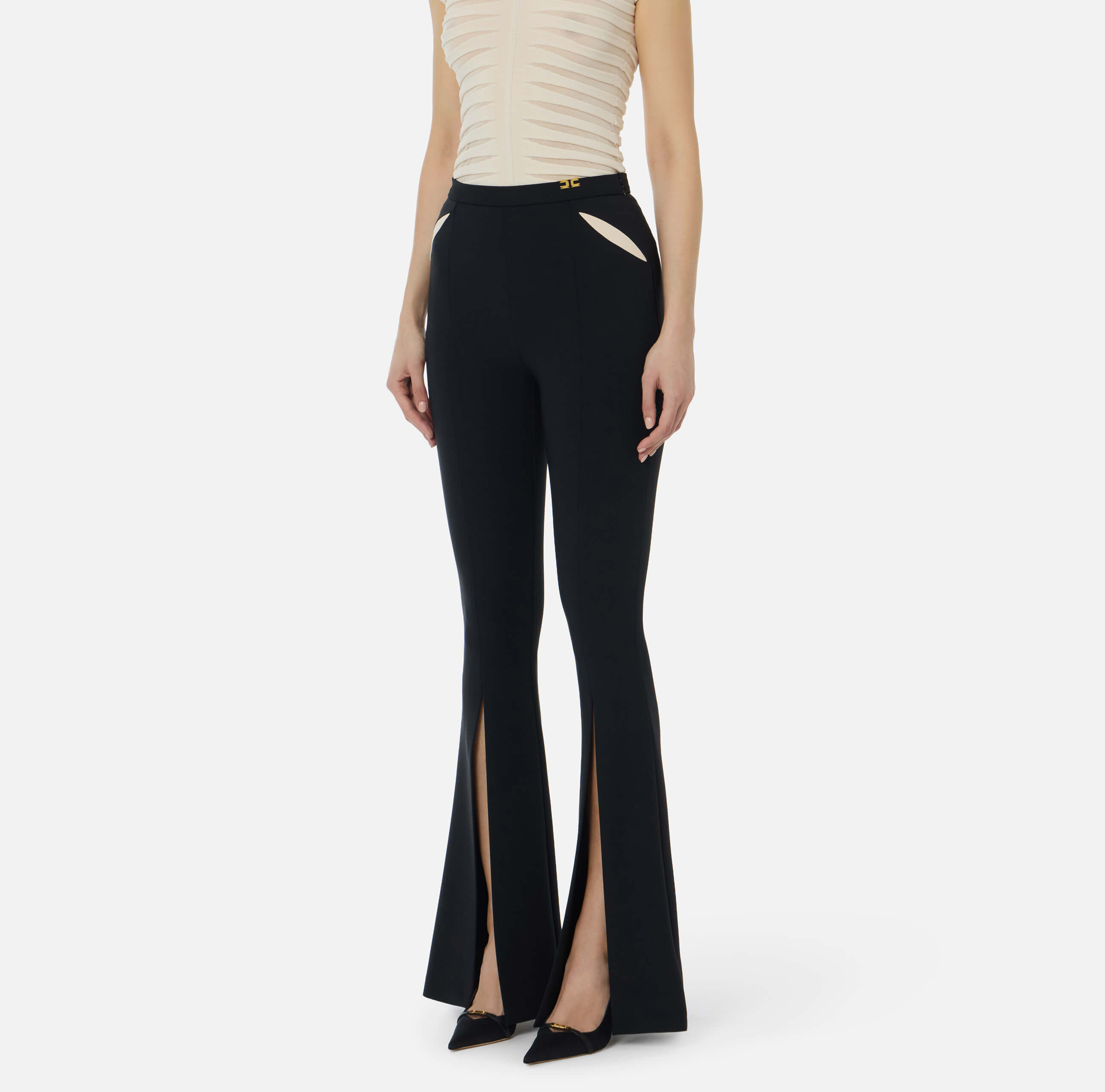 Trousers in lightweight crêpe fabric with cut-outs and slits