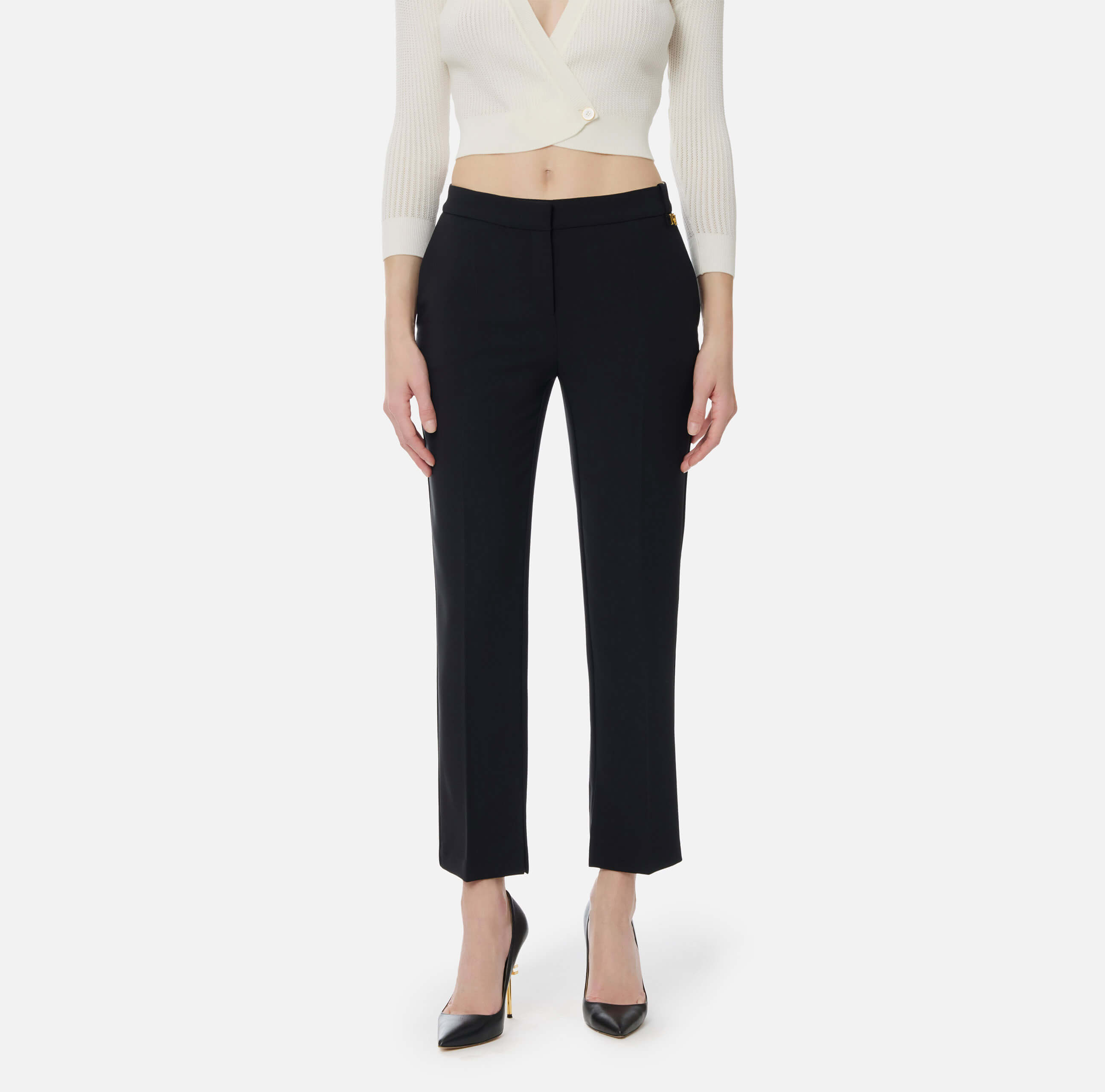 Trousers in lightweight crêpe fabric with logo charm