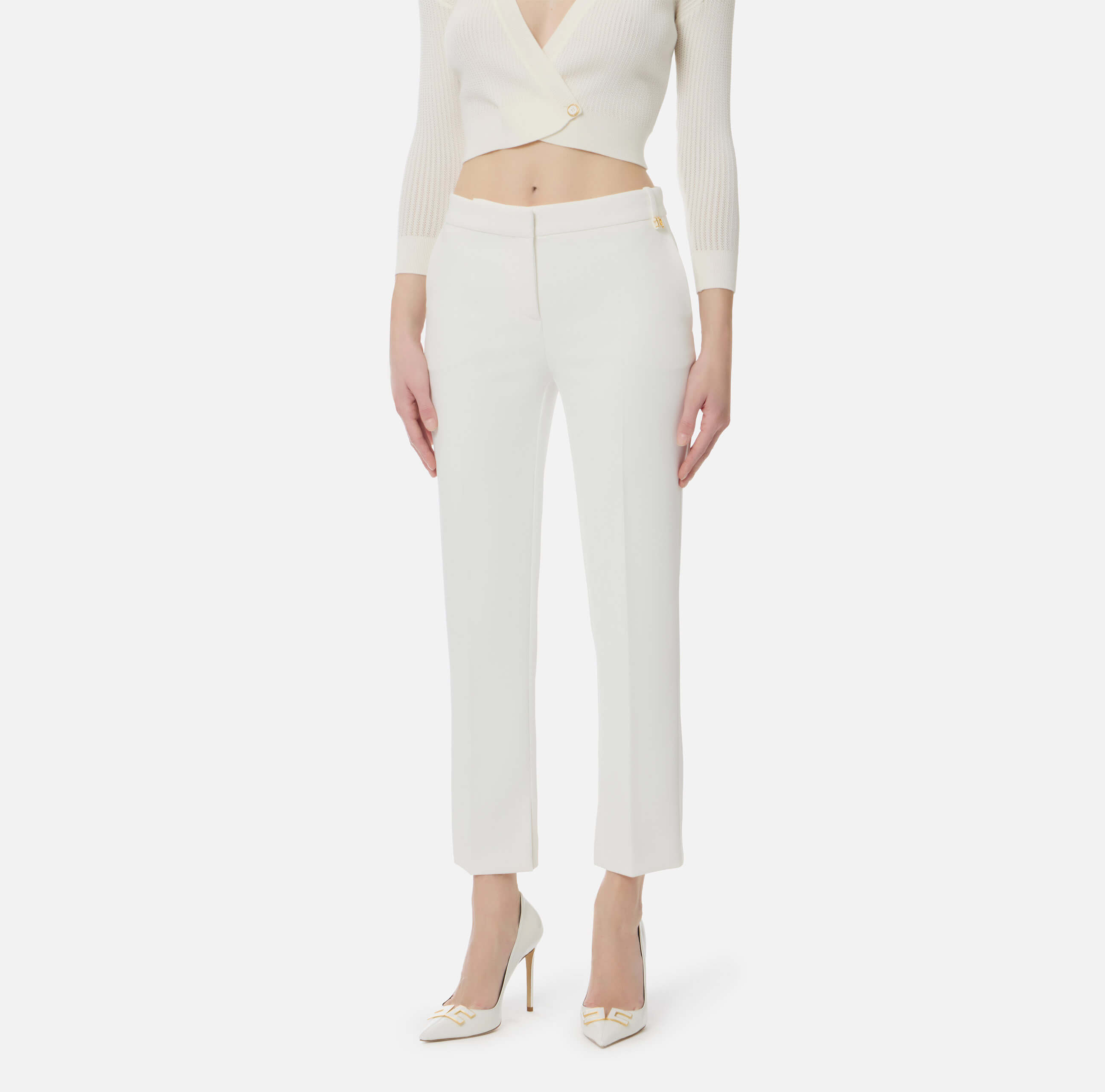 Trousers in lightweight crêpe fabric with logo charm