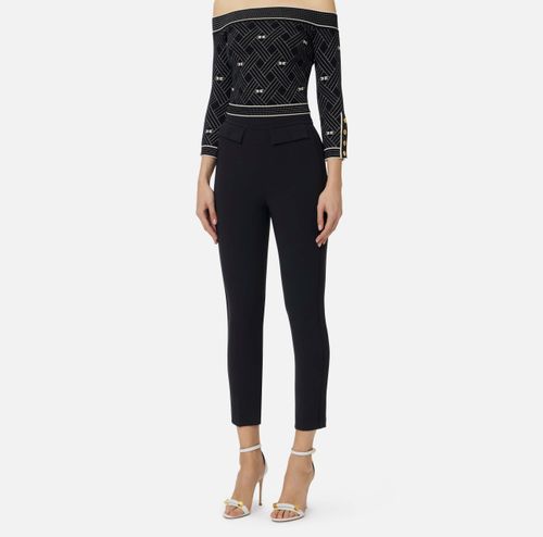 Trousers in double layer stretch crêpe fabric with embroidered logo