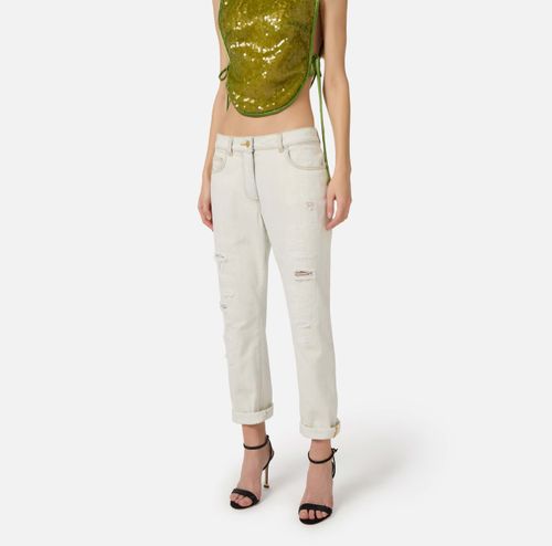 Jeans with distressed details