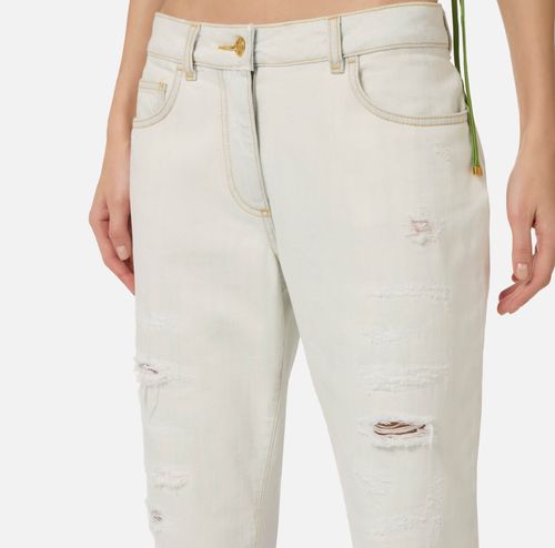 Jeans with distressed details