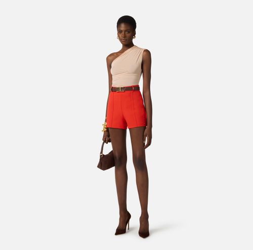 Shorts in lightweight crêpe fabric with raw-edge fabric