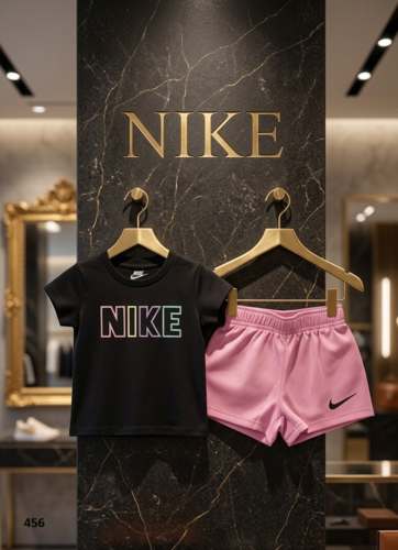 חליפת קיץ קצרה לבנות מבית NIKE מקורית - חולצה שחורה ומכנס ורוד