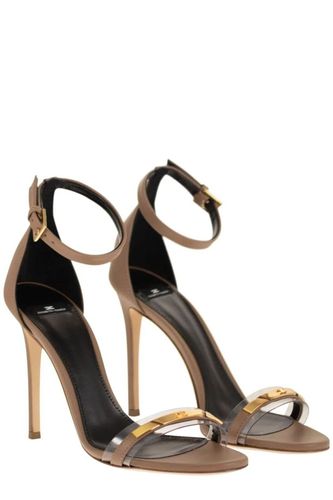 Leather sandal with transparent insert