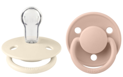 זוג מוצצי סיליקון De Lux שמנת/ורוד 0+ חודשים BIBS