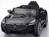 מכונית ממונעת 12V בדמות BMW Z4 עם גלגלי EVA, מערכת מולטימדיה, אורות ושלט רחוק - שחור מטאלי