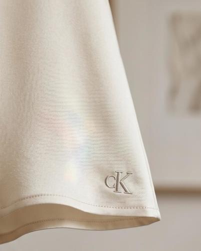 שמלה CALVIN KLEIN מידות 4-16 לילדים בגוון שמפניה