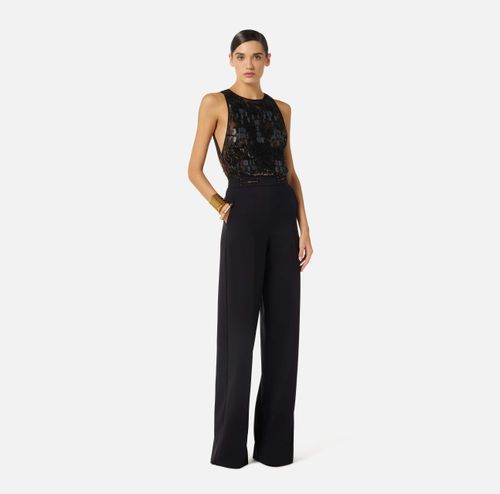 Jumpsuit in crêpe fabric with embroideries