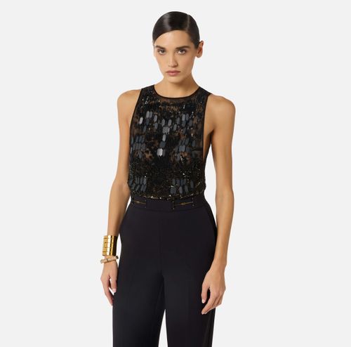 Jumpsuit in crêpe fabric with embroideries