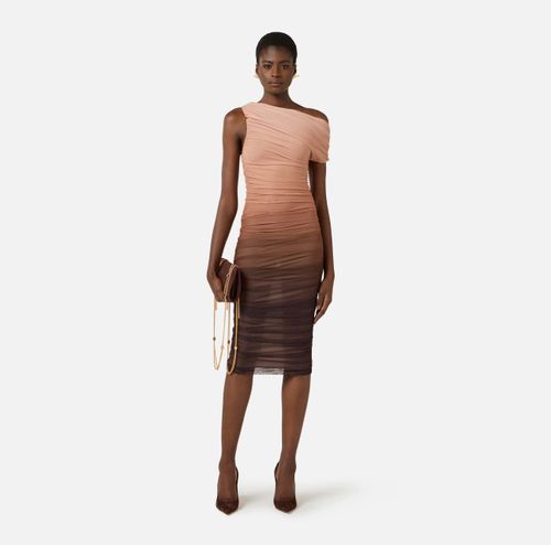 Dress in graduated tulle fabric
