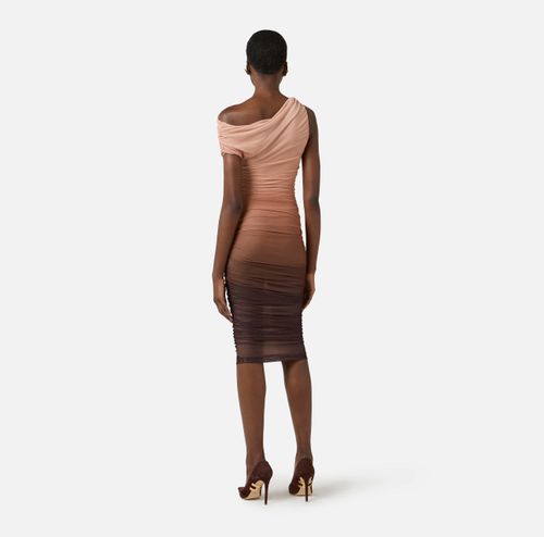 Dress in graduated tulle fabric