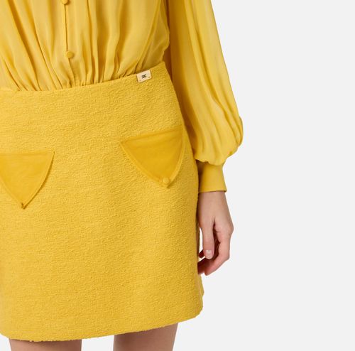 Dress in georgette and bouclé tweed fabrics