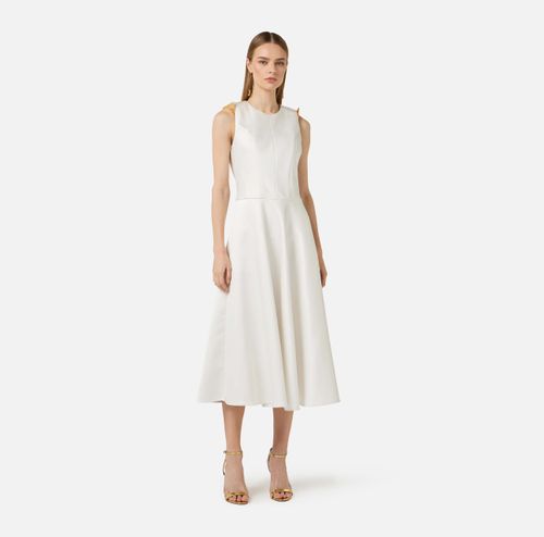 Duchess satin dress with jewel details on the shoulders