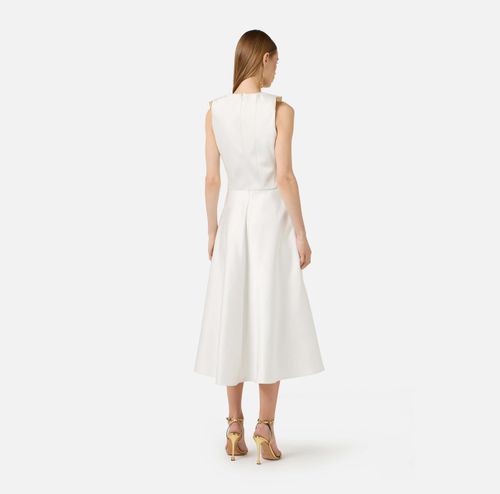 Duchess satin dress with jewel details on the shoulders