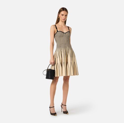 Dress in two-colour knit fabric