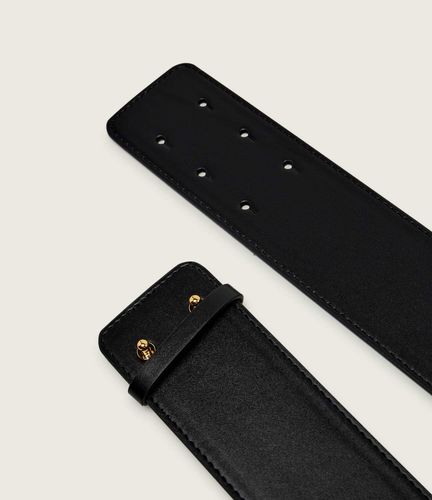 Wide belt with logo plaque